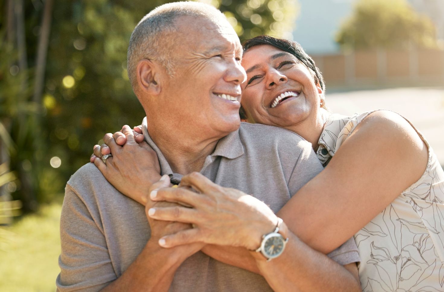 People Happy About Hearing Aid Financing happy couple smiling after financing hearing aids.